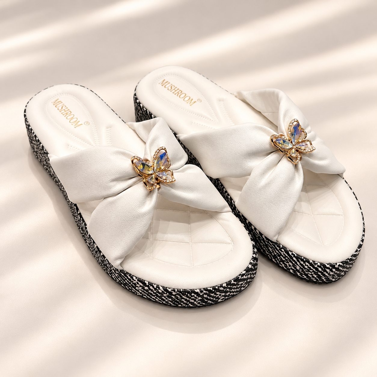 9be4548a-e066-4820-8d6d-20cf9442067d Women’s Butterfly Charm Cushioned Slides